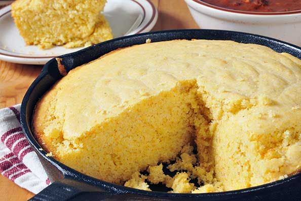 Cornbread cooked in cast iron skillet